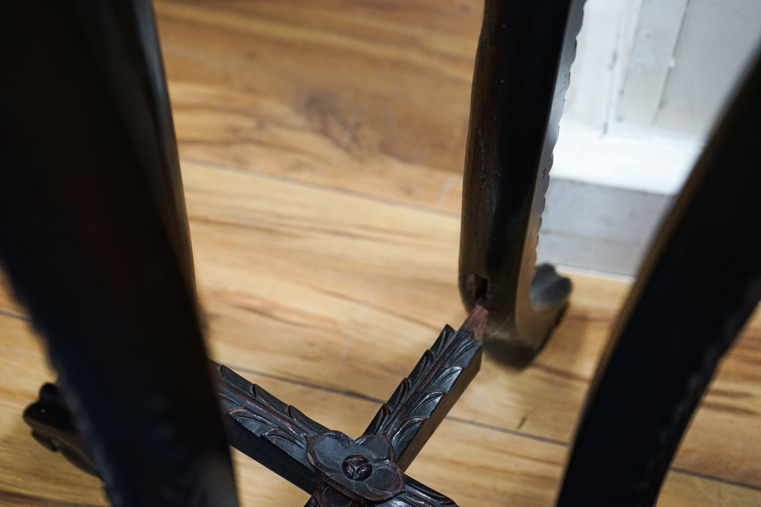 A Chinese circular marble top carved padouk jardiniere stand, height 91cm
